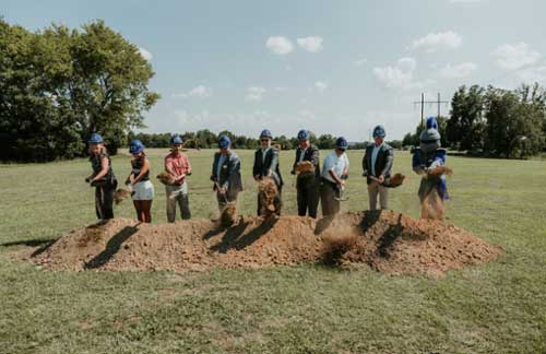 MGA and Macon-Bibb representatives break ground at the Georgia Premier course. 